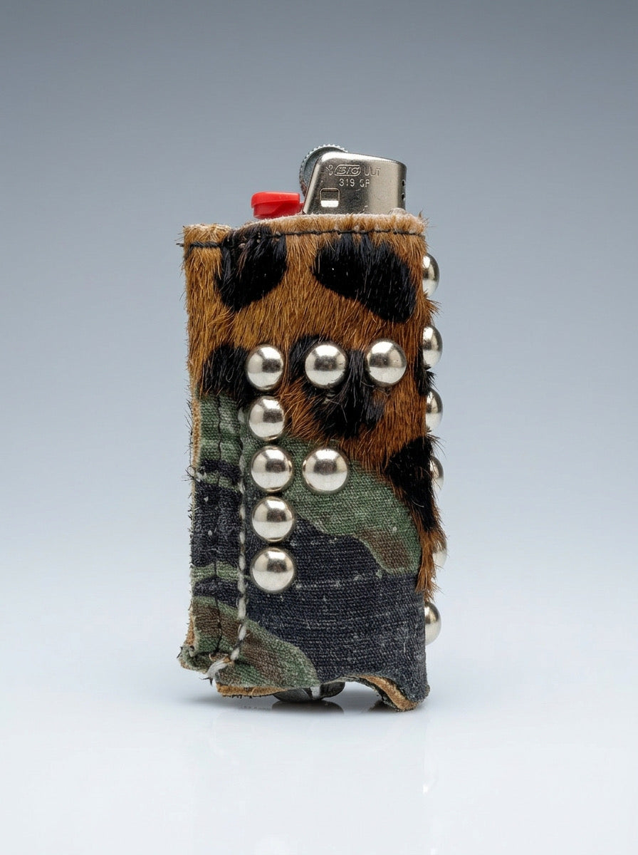 Patchworked camouflage textile and leopard-pattern hair-on leather lighter case